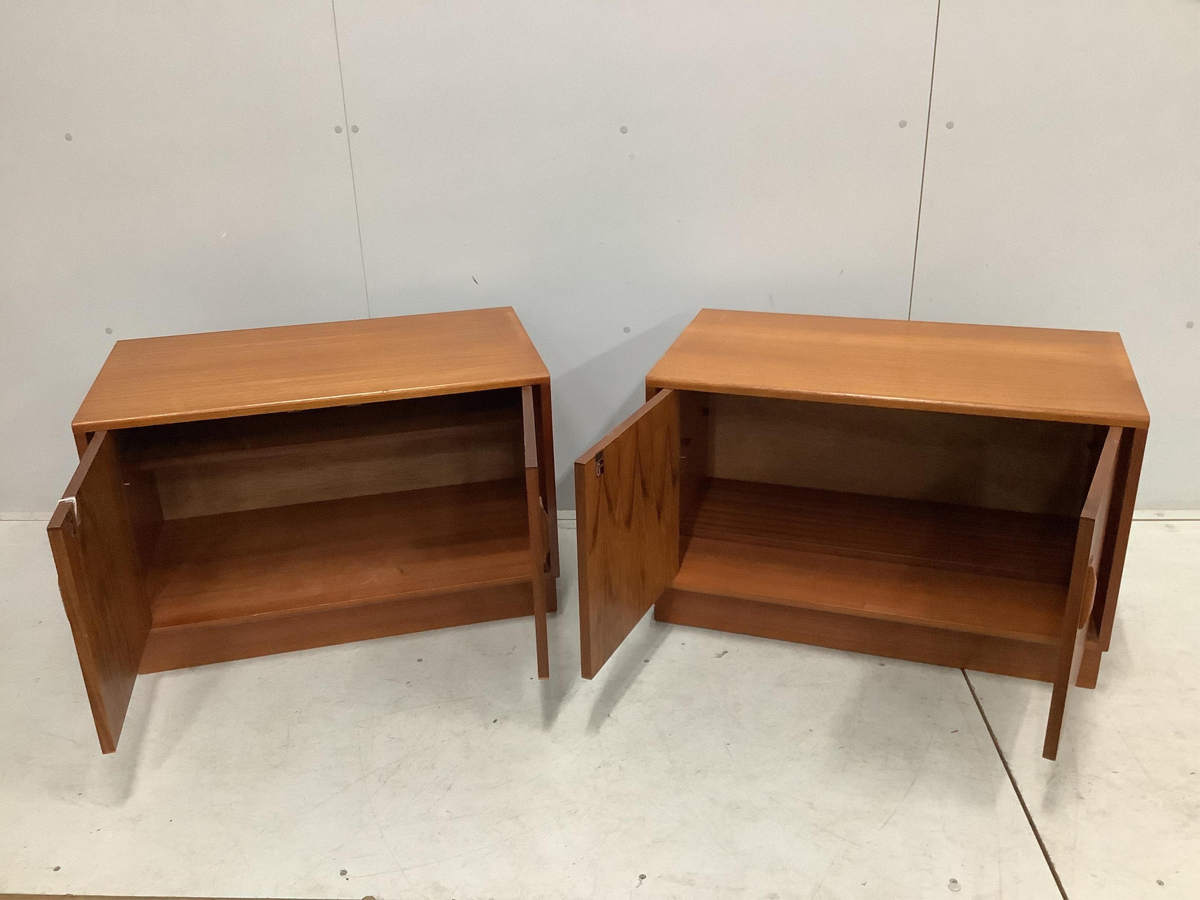 A pair of mid century G Plan teak low cabinets, width 81cm, depth 46cm, height 54cm. Condition - good